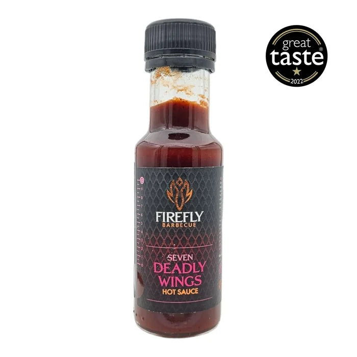 7 Deadly Wings hot sauce bottle with fiery label, extreme hot sauce for wings