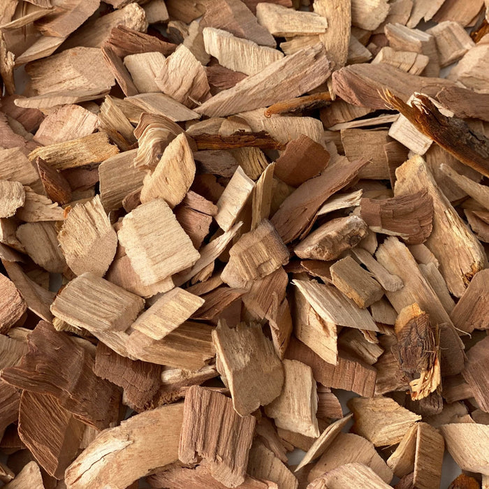 Close-up of chopped apple wood for smoking meats