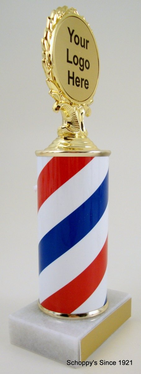 A trophy featuring a barber pole design with a column in the center, topped with a blank logo disc, on a white base with a blank engraving plate against a white background.