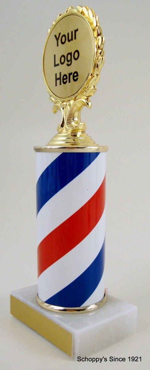 A trophy featuring a barber pole design with a column in the center, topped with a blank logo disc, on a white base with a blank engraving plate against a white background.