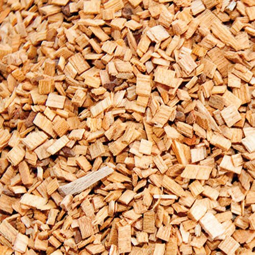 Close-up of chopped oak wood chips for smoking