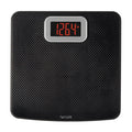 Carbon fiber textured bathroom scale with a silver-framed red LCD display showing 126.4 lb