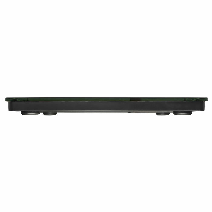 Low angle side view of carbon fiber digital body composition scale against a white background