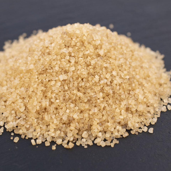 Close-up of light brown sea salt granules
