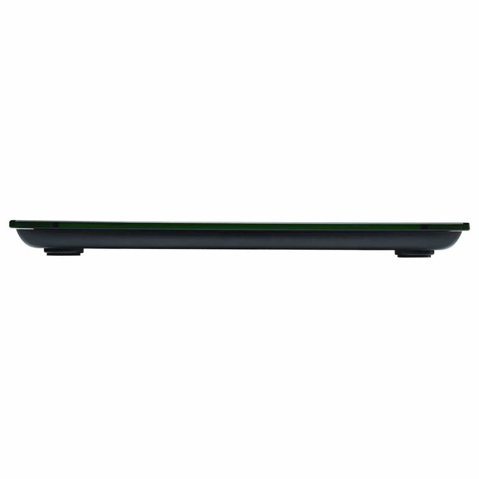 Side profile of a textured black digital bathroom scale with a glass top