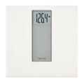 White and gray digital bathroom scale close up showing 126.4 lb on the display