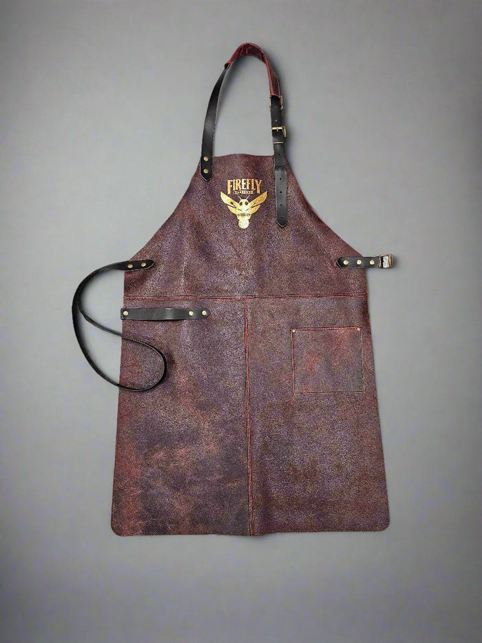 Leather BBQ apron with logo on gray background