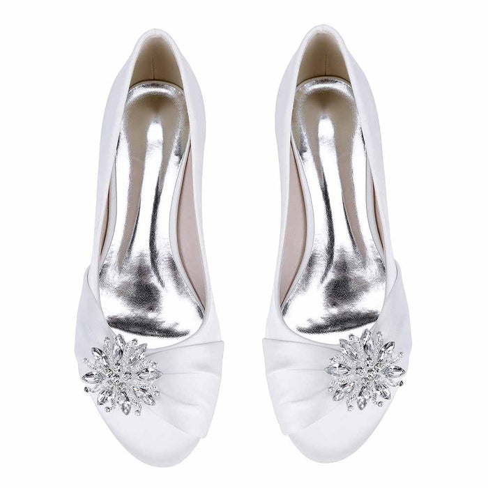 Elegant S&DCo. flat wedding shoes for bride with shimmering jewel embellishment and soft white fabric