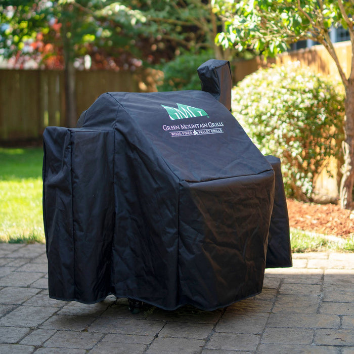 Weatherproof GMG Grill Full-Length Cover fitted on Green Mountain Grill with chimney and side shelf, perfect for patio grilling - FireFly Barbecue
