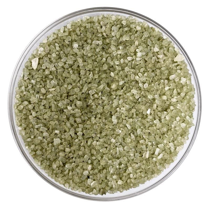 Close-up of greenish Hawaiian Jade Sea Salt in glass container