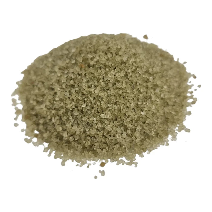 Granulated Hawaiian Jade Sea Salt on white surface