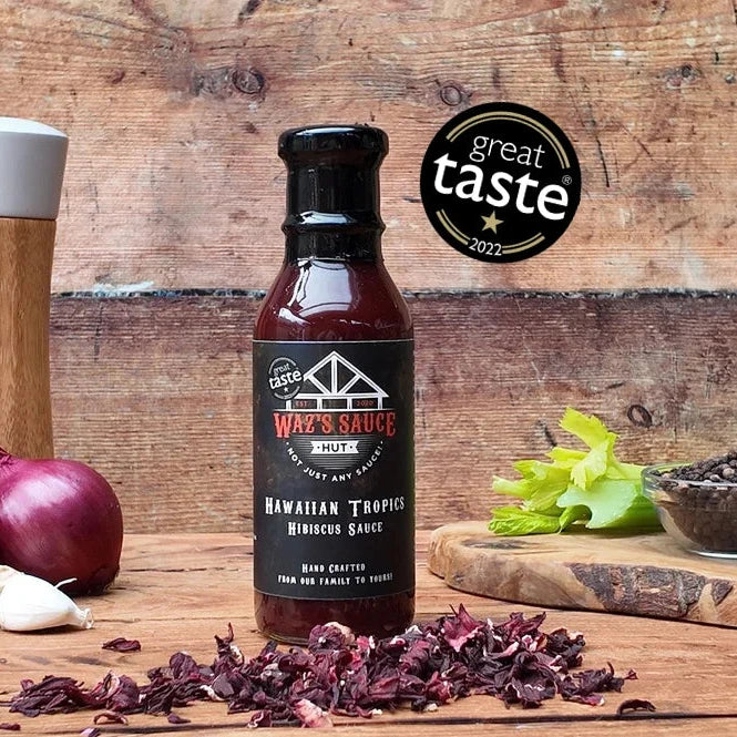 Hawaiian Tropics Hibiscus Sauce on rustic wooden background