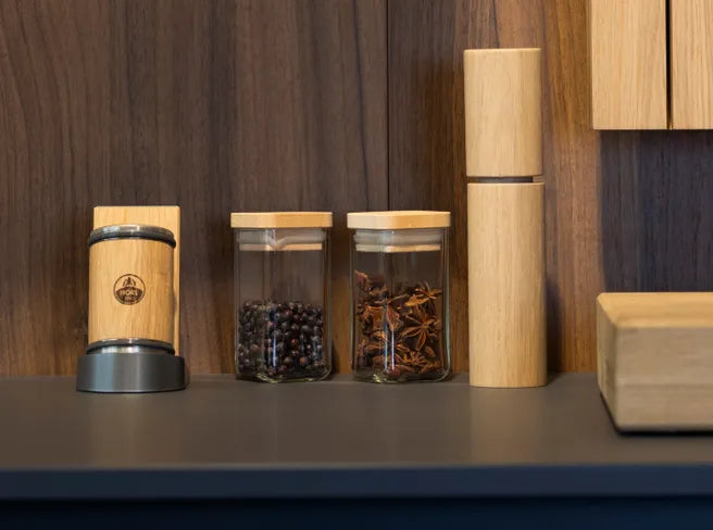 Horl knife sharpeners in wooden and glass containers on kitchen shelf