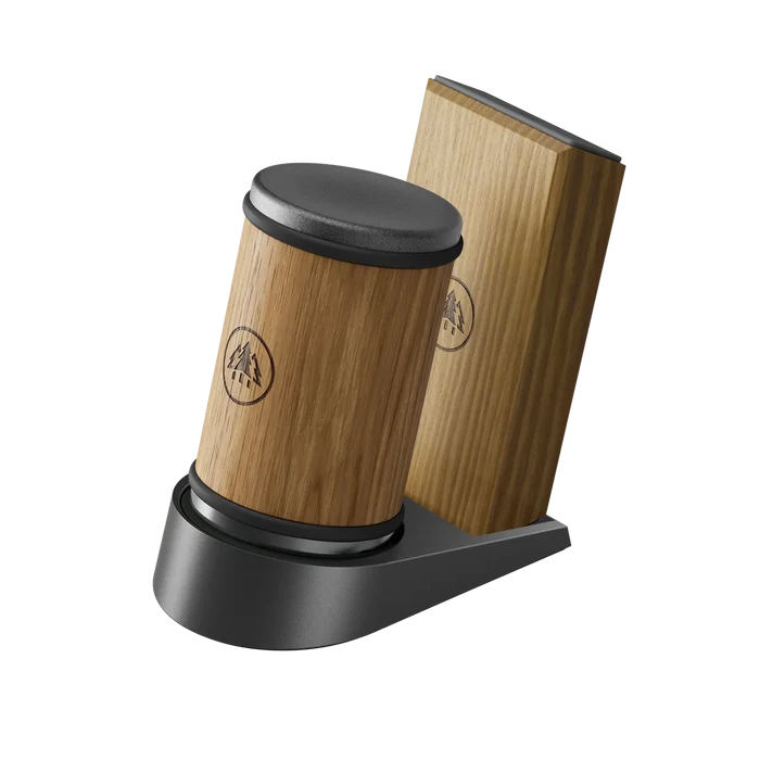 Set of Horl Dock knife sharpeners and storage containers on black background