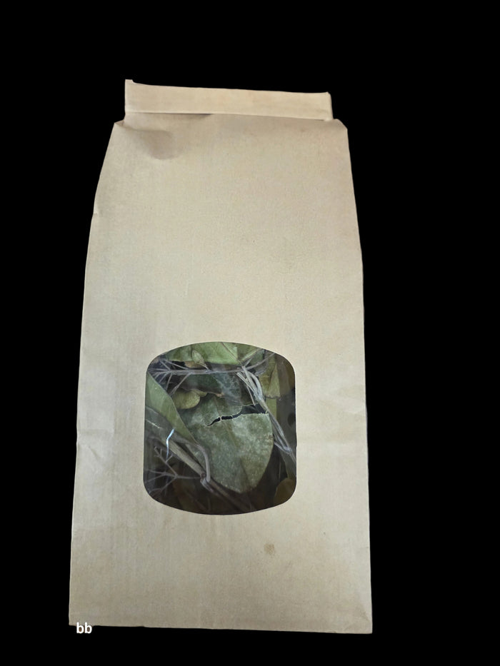 Brown paper bag with pimento leaves for jerk