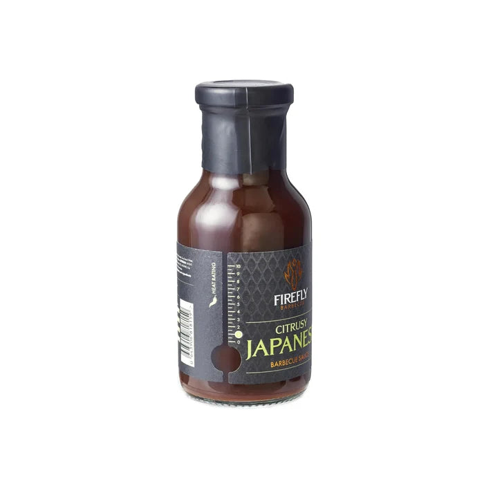 Side view of Firefly Japanese BBQ Sauce 250ml bottle showing label and measurement scale. Yuzu-infused marinade for savory citrus flavor.