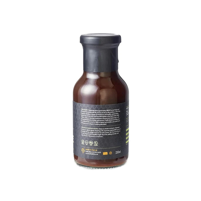 Back label of Firefly Japanese BBQ Sauce 250ml bottle with ingredients and certifications. Halal, vegetarian-friendly citrus marinade.