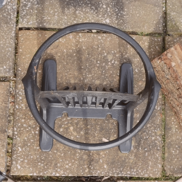 Outdoor scene with log splitter and hammer for firewood preparation