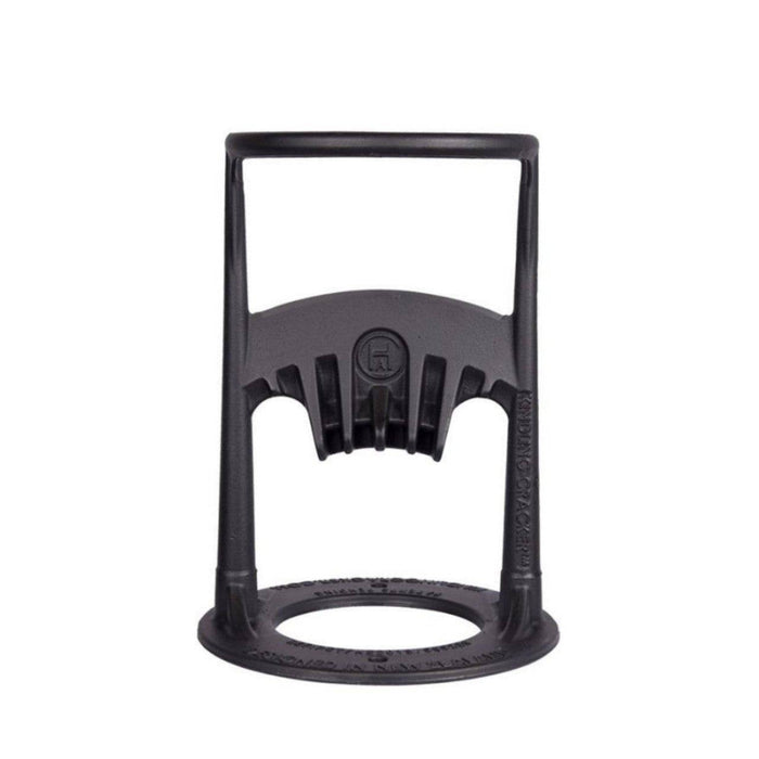 Black plastic log splitter with wood for kindling