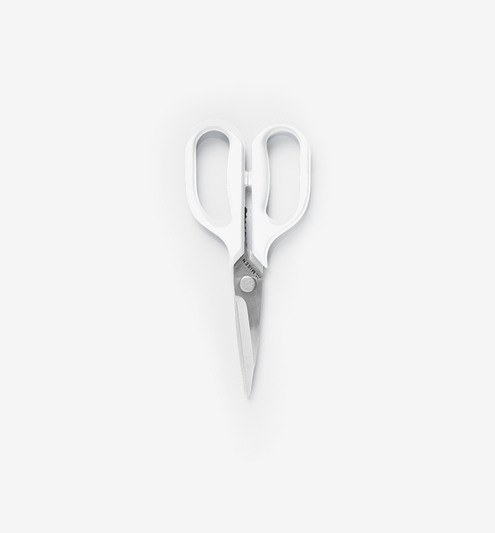 Misen kitchen shears with white handles and stainless steel blades