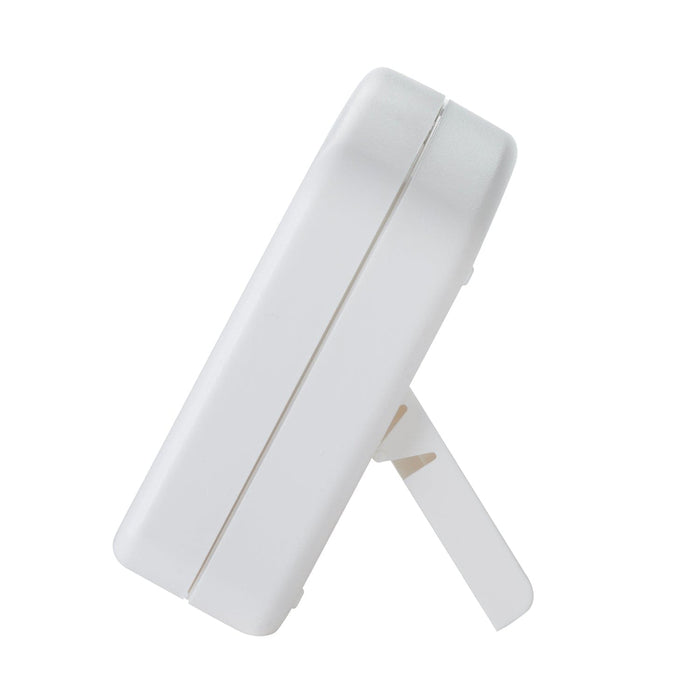 Angled side view of white memory timer with foldout stand extended.