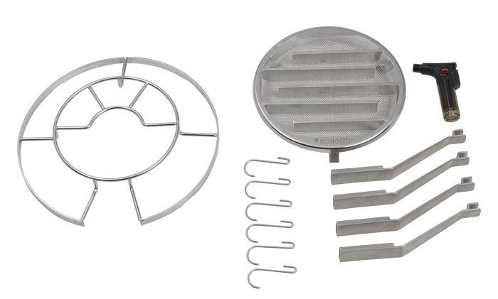 Cross-section of Monolith outdoor grill showing internal heating chamber and grill grate