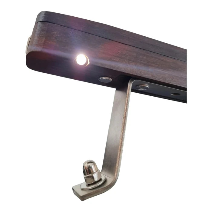 Close-up of LED handle with integrated grill light for outdoor cooking