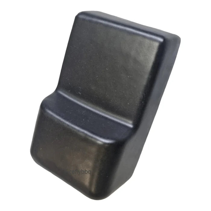 Close-up of black ceramic grill feet for outdoor cooking