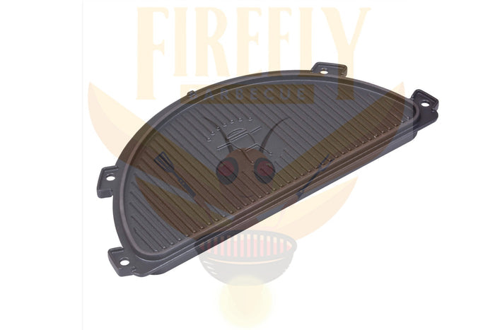 Outdoor grill accessory with cast iron and stainless steel components