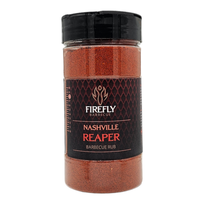 Firefly BBQ Nashville Hot Seasoning Reaper Level 5 BBQ Rub in a clear spice jar with black lid. Features bold label design for fiery heat flavor.