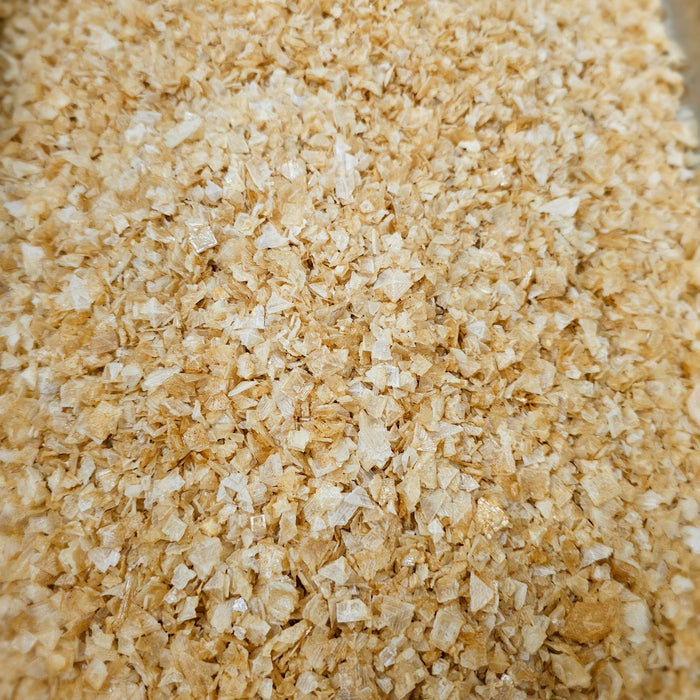 Close-up of salt granules in jar