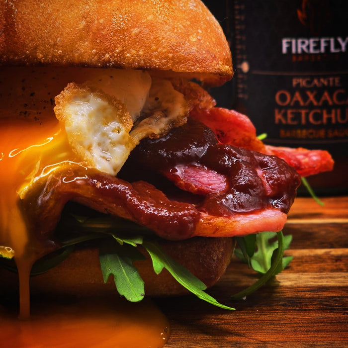 Close-up of spicy barbecue burger with fried egg and bacon
