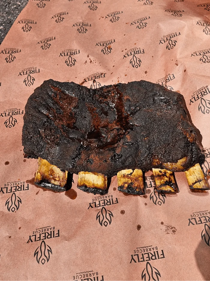 BBQ smoked meat on Firefly Barbecue branded parchment paper