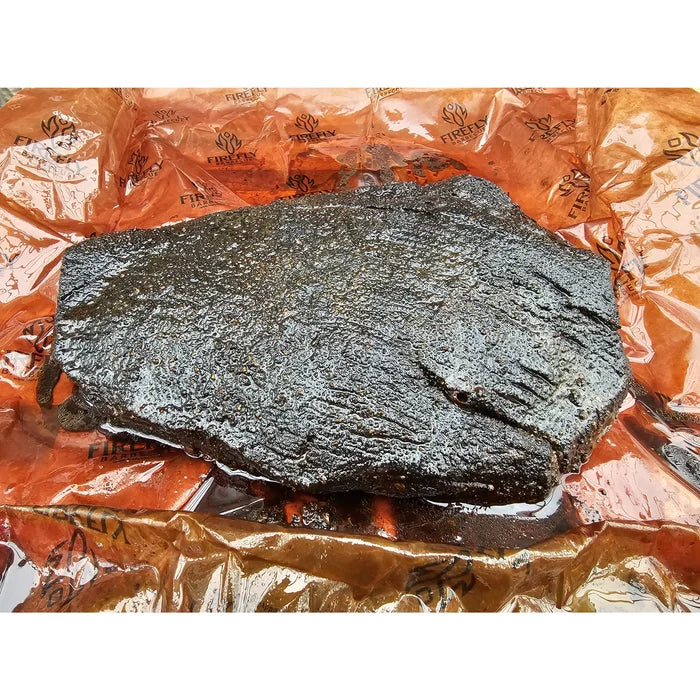 OREN Pink Butchers Paper Roll - BBQ Meat Smoking | FDA Approved unwrapped to reveal smoked brisket, highlighting moisture retention and bark preservation.