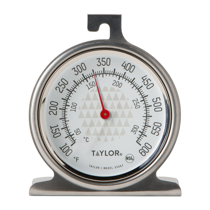 Analog oven thermometer with round dial and metal hook showing around 350 degrees