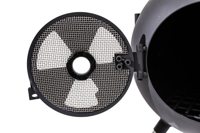 Close-up of Ozpig Series 2 Portable Wood Fired BBQ Stove door with mesh screen, designed for safe and efficient wood burning outdoors.