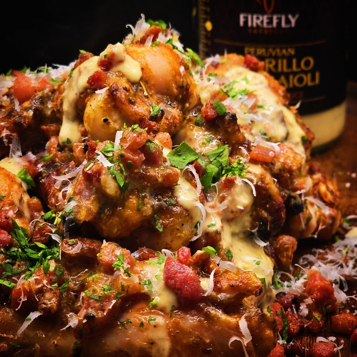 Savory dish topped with Peruvian Amarillo Chilli Aioli and bacon