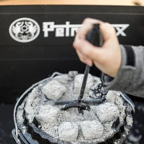 Using Petromax Lid Lifter to lift hot Dutch oven lid