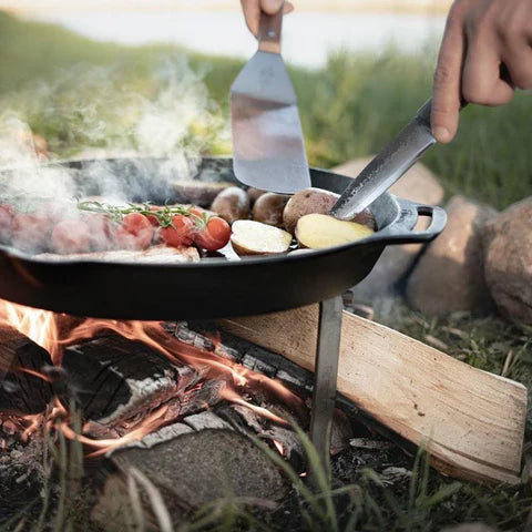 Petromax flexible stainless spatula used for outdoor grilling with long handle