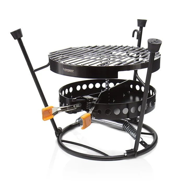 Petromax grill with adjustable height for versatile outdoor cooking