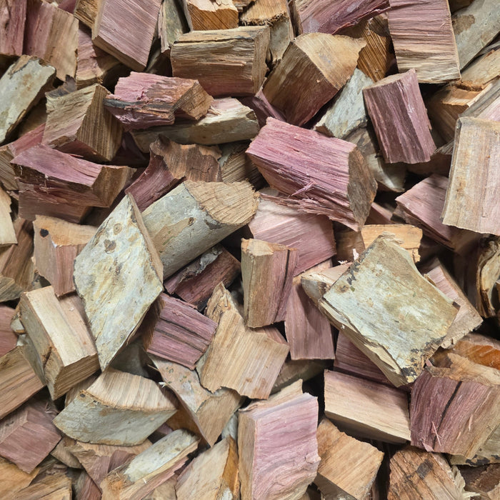 Stack of pinkish wood chunks for smoking and grilling