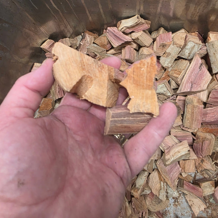 Close-up of wood chunks with pink and beige tones for outdoor grilling