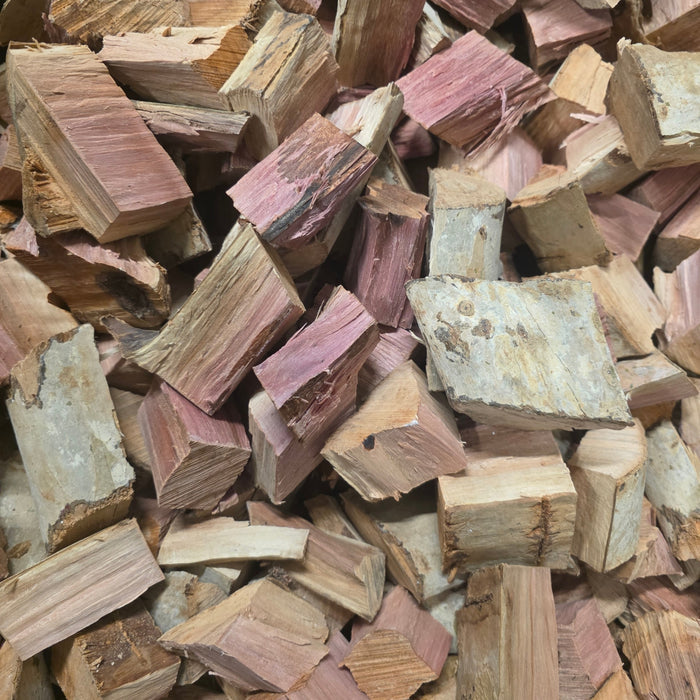 Wood chunks with pink and beige colors, measuring approximately 4 inches