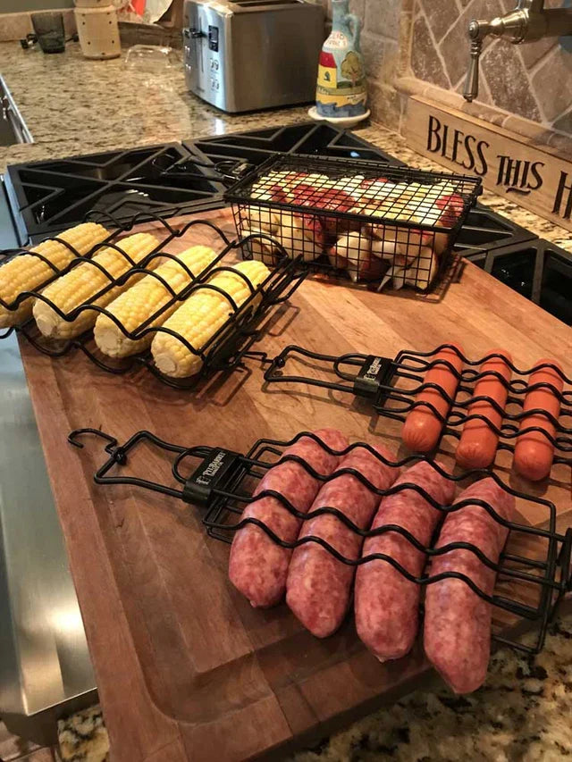 Pit Barrel 3-Hanger Value Pack - FireFly Barbecue shown with corn, sausages, hot dogs, and vegetables loaded in hangers. Ideal for grilling multiple items at once.