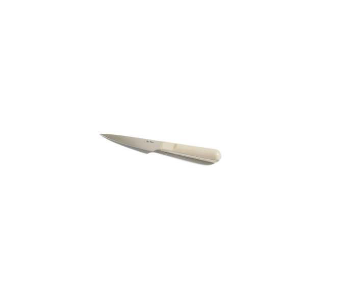 The Precise Paring Knife features a beige handle and an ultra-sharp German steel blade, shown against a plain white background.