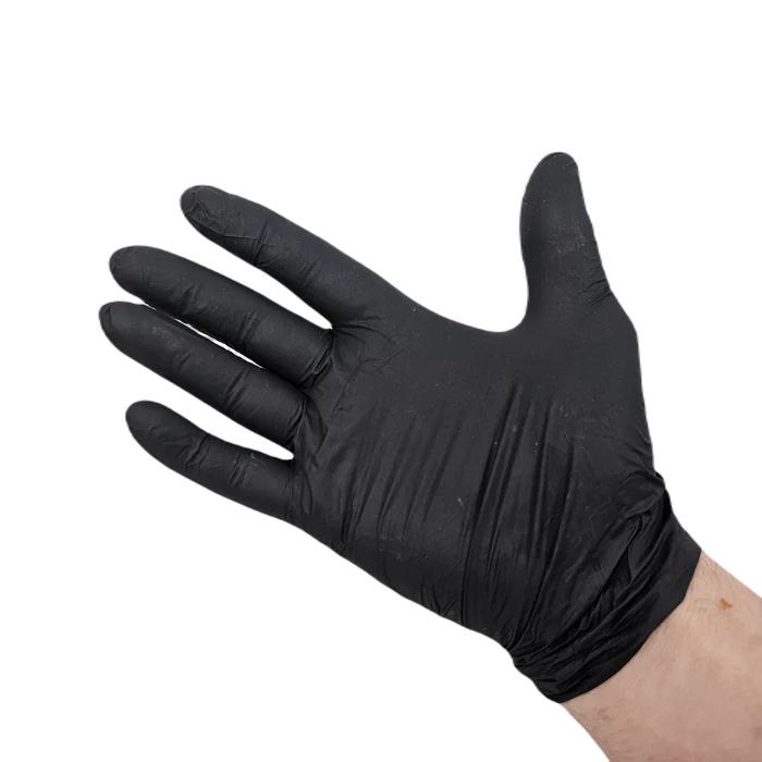 Black nitrile glove on hand