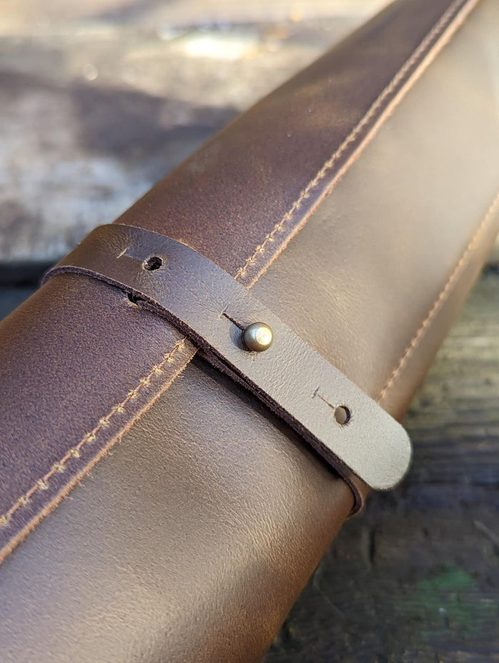 Leather knife roll with stitching detail