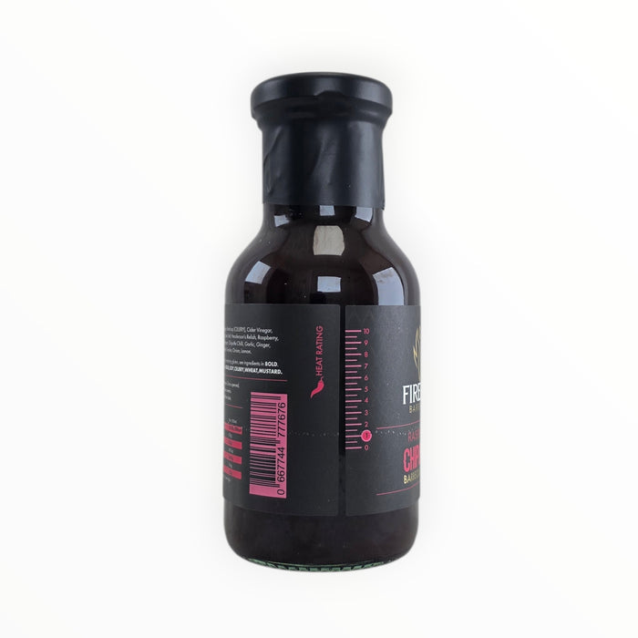Black BBQ sauce bottle with pink measurement markings and Firefly logo