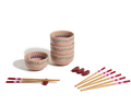 The Rice Bowl Set includes four pink, floral-patterned bowls stacked beside two more bowls, six pairs of pink-tipped chopsticks, and four red chopstick rests, all displayed on a white background.