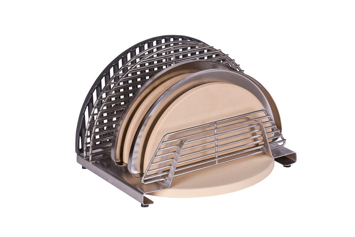 Close-up of stainless steel BBQ tool rack with multiple slots for grill accessories, outdoor setting